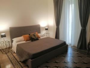 Giường trong phòng chung tại Appartamento Catania centro