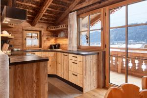Kuchyň nebo kuchyňský kout v ubytování Promi Alm Flachau - Luxus Chalets