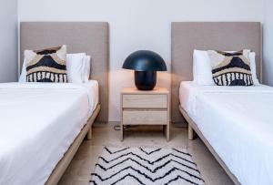 Łóżko lub łóżka w pokoju w obiekcie MA7B-Stunning holiday home top location