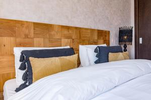 Łóżko lub łóżka w pokoju w obiekcie MA7B-Stunning holiday home top location