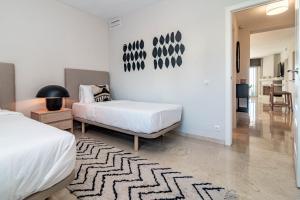 Łóżko lub łóżka w pokoju w obiekcie MA7B-Stunning holiday home top location