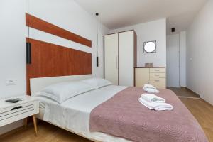 Postel nebo postele na pokoji v ubytování Apartment Meira br3