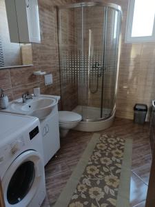 Kúpeľňa v ubytovaní Apartmani Sunčev sjaj + 37 fotografií