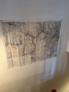a map is hanging on a wall at The Old Pie Shop Hebden Bridge in Hebden Bridge