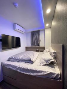 Voodi või voodid majutusasutuse T A B Hotel toas +31 fotot