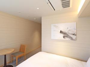Postel nebo postele na pokoji v ubytování Chisun Inn Yokohama Tsuzuki + 35 fotografií