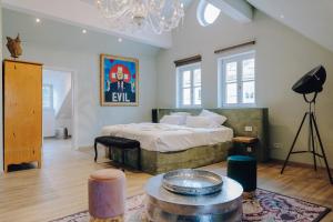 Postel nebo postele na pokoji v ubytování Little 7 - Boutique Hotel + 28 fotografií