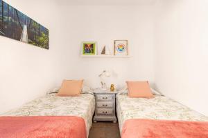 Posteľ alebo postele v izbe v ubytovaní Espectacular casa muy luminosa con azotea
