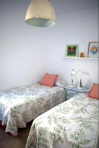 Posteľ alebo postele v izbe v ubytovaní Espectacular casa muy luminosa con azotea