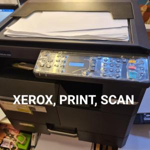 an office printer with the words kerox print scan at CHE & JAMES FEMALE GUEST House COLON, CEBU in Cebu City