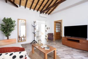 TV a/nebo společenská místnost v ubytování Casa Evaristo with Roque Nublo view
