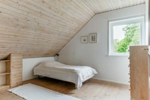 Posteľ alebo postele v izbe v ubytovaní Architect-designed house in Jarna with fantastic views