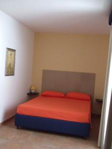 Posteľ alebo postele v izbe v ubytovaní Residence La Corte