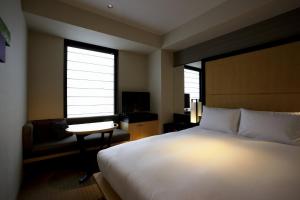 Postel nebo postele na pokoji v ubytování KOKO HOTEL Premier Kanazawa Korinbo + 37 fotografií