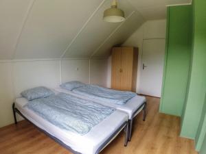 Postel nebo postele na pokoji v ubytování Holiday Home Lužnice by Interhome
