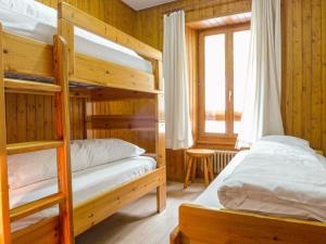 Llit o llits en una habitació de Apartment Résidence 35 by Interhome