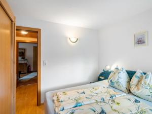 Posteľ alebo postele v izbe v ubytovaní Apartment Kitzsteinhorn by Interhome