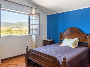 Postel nebo postele na pokoji v ubytování Holiday Home Marta by Interhome