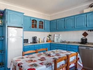 Kuchyň nebo kuchyňský kout v ubytování Holiday Home Marta by Interhome