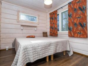 Postel nebo postele na pokoji v ubytování Holiday Home Rukan villa lux a by Interhome