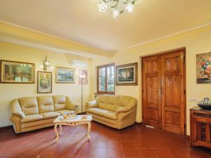 A seating area at Holiday Home Costacce by Interhome