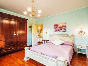 A bed or beds in a room at Holiday Home Costacce by Interhome