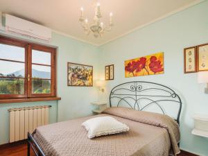 A bed or beds in a room at Holiday Home Costacce by Interhome