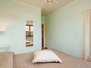A bed or beds in a room at Holiday Home Costacce by Interhome