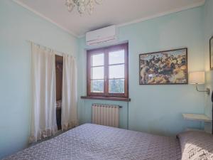 A bed or beds in a room at Holiday Home Costacce by Interhome
