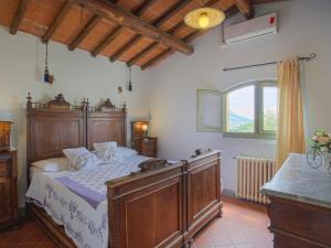 A bed or beds in a room at Holiday Home Borgo della Limonaia-4 by Interhome