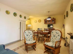A television and/or entertainment centre at Holiday Home Borgo della Limonaia-4 by Interhome