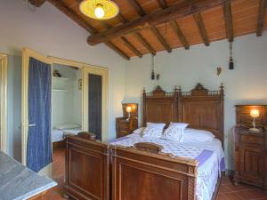 A bed or beds in a room at Holiday Home Borgo della Limonaia-4 by Interhome