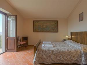 Posteľ alebo postele v izbe v ubytovaní Holiday Home Montechioccioli-1 by Interhome + 26 fotografií