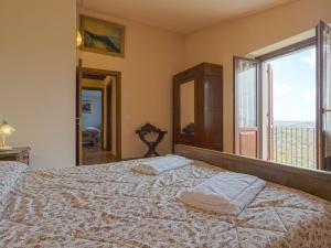 Posteľ alebo postele v izbe v ubytovaní Holiday Home Montechioccioli-1 by Interhome