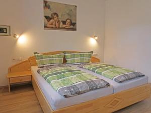 Postel nebo postele na pokoji v ubytování Apartment Susi by Interhome