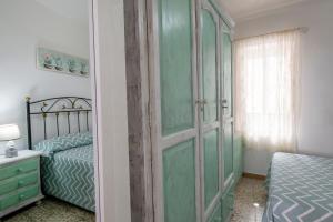 Posteľ alebo postele v izbe v ubytovaní Encantadora casa de pueblo para 7 pax con gran Terraza