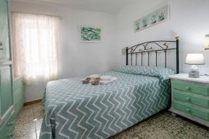 Posteľ alebo postele v izbe v ubytovaní Encantadora casa de pueblo para 7 pax con gran Terraza