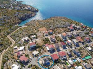 an aerial view of a village next to the ocean at Holiday Home Golic - KBG302 by Interhome in Karlobag