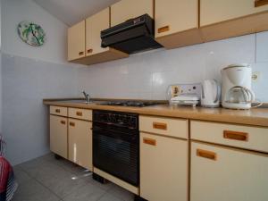 Kuchyň nebo kuchyňský kout v ubytování Apartment Ivka - apt-3 by Interhome