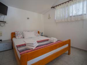 Postel nebo postele na pokoji v ubytování Apartment Ivka - apt-3 by Interhome