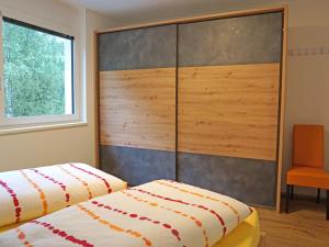 Postel nebo postele na pokoji v ubytování Apartment Apart Annabell by Interhome