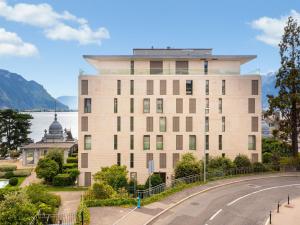 a building with a road in front of it at Apartment L'Esplanade A6-14 by Interhome in Montreux