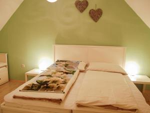 Posteľ alebo postele v izbe v ubytovaní Apartment Hofgasse-3 by Interhome