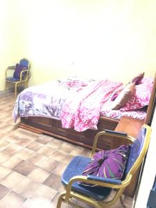 Llit o llits en una habitació de Bel Appartement 2 chambres meublé à Bafoussam