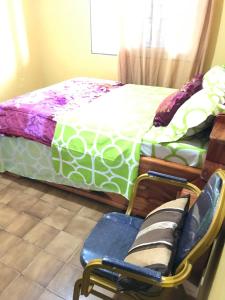 Llit o llits en una habitació de Bel Appartement 2 chambres meublé à Bafoussam