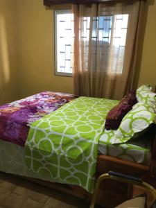 Llit o llits en una habitació de Bel Appartement 2 chambres meublé à Bafoussam