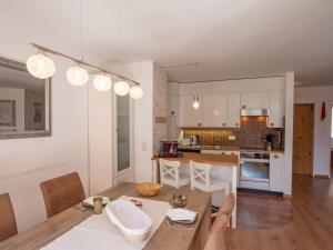 Kuchyň nebo kuchyňský kout v ubytování Apartment Chesa Piz Cotschen 3 by Interhome + 20 fotografií