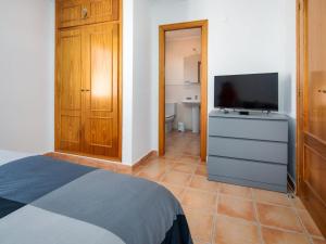 Televízia a/alebo spoločenská miestnosť v ubytovaní Villa Bellvue by Interhome