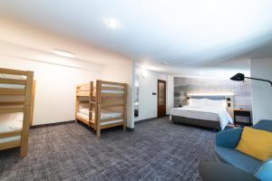 Voodi või voodid majutusasutuse OREA Hotel Špičák Šumava toas