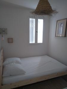 Posteľ alebo postele v izbe v ubytovaní Appartement lumineux à 100 mètres de la plage